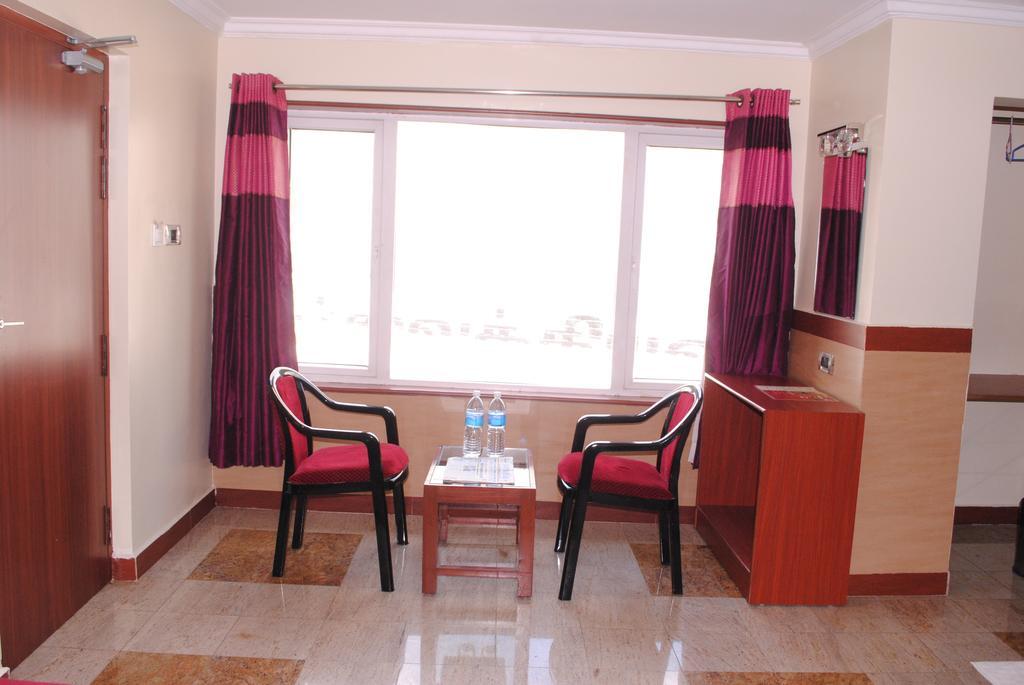 Готель Everestparkresidency Tiruchirappalli Номер фото